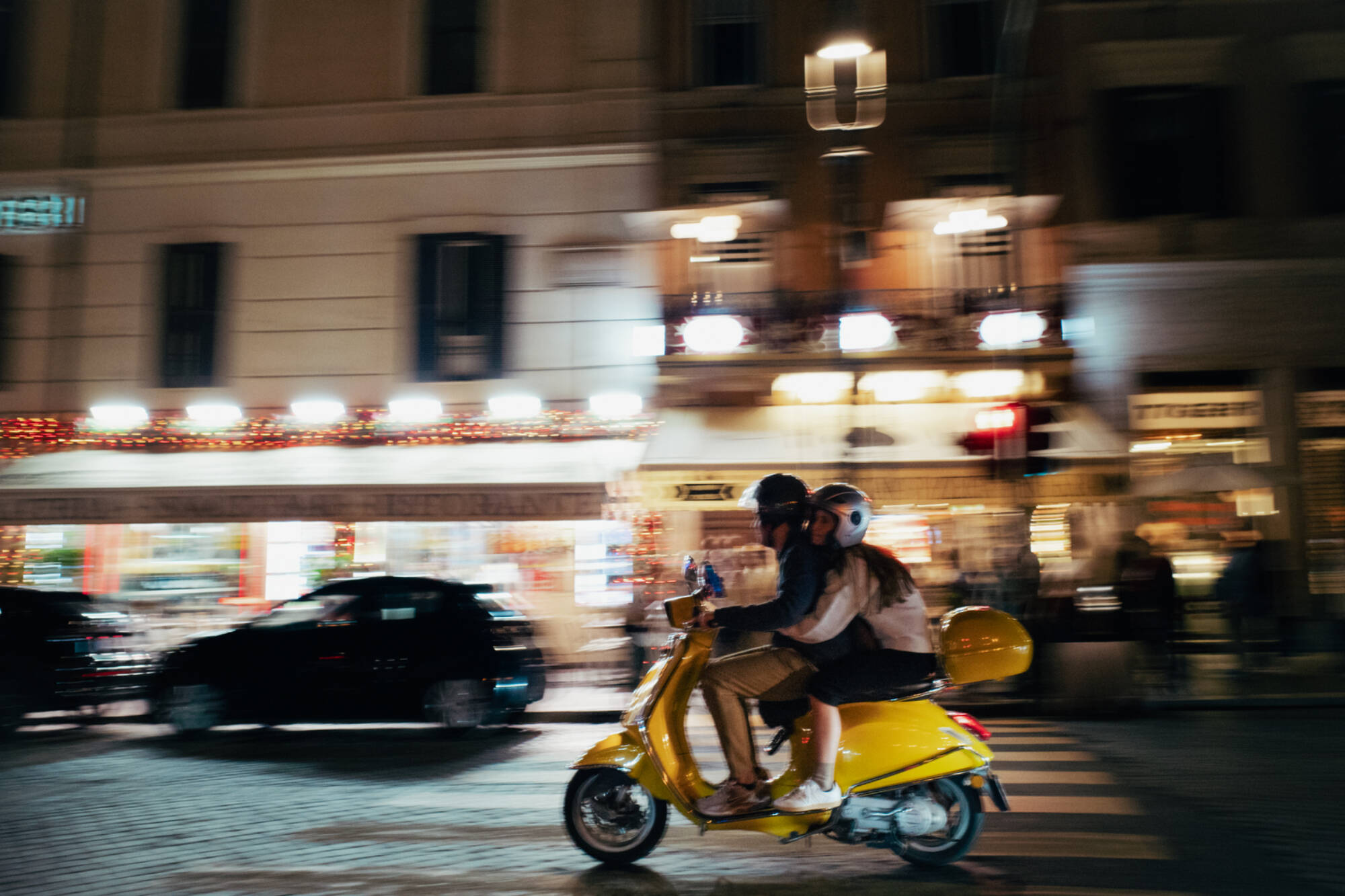 Sander Breneman - photo of two people on a moped in Italy